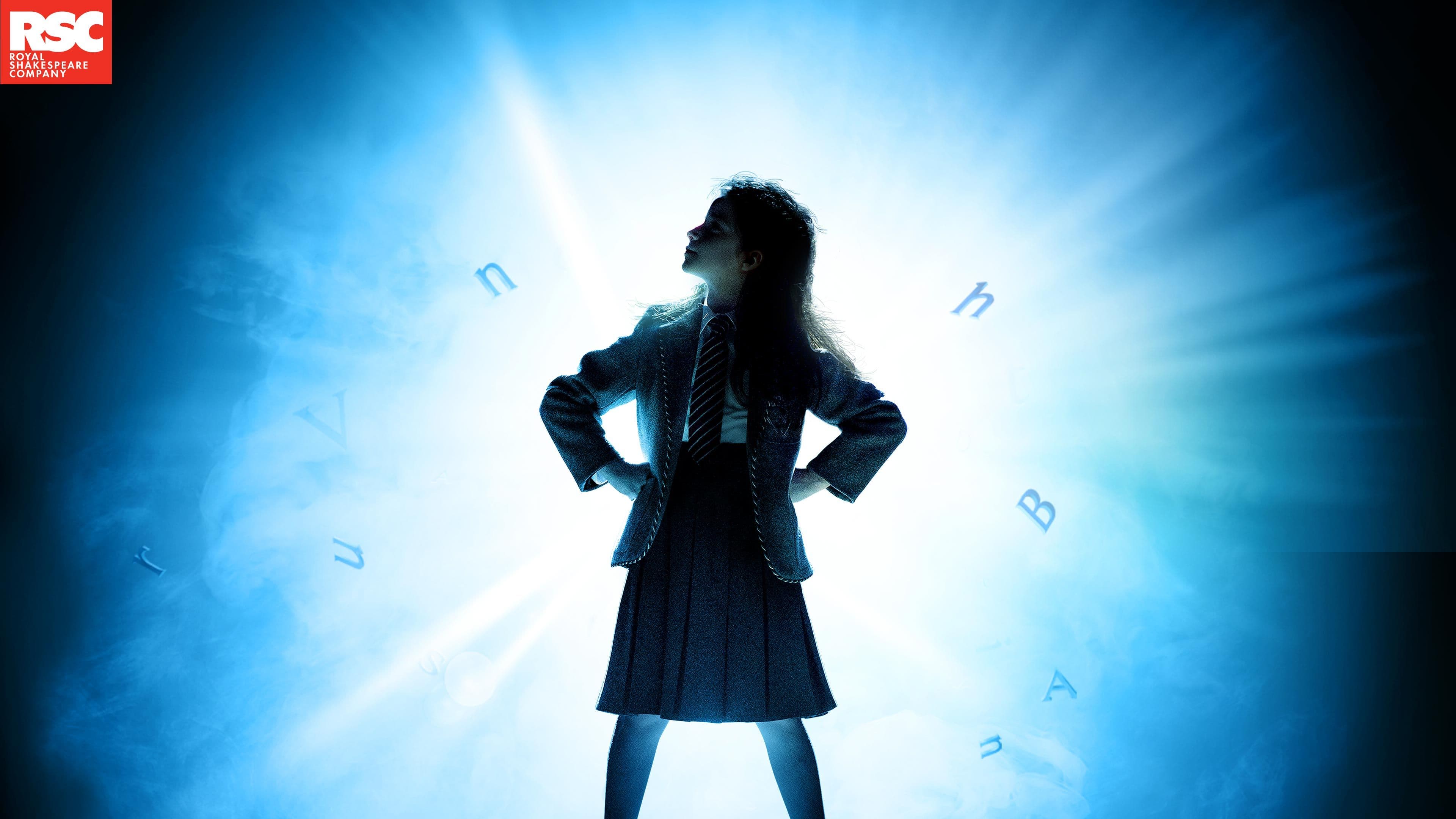 Silhouette of a young girl standing powerfully against a bright blue light with floating letters.