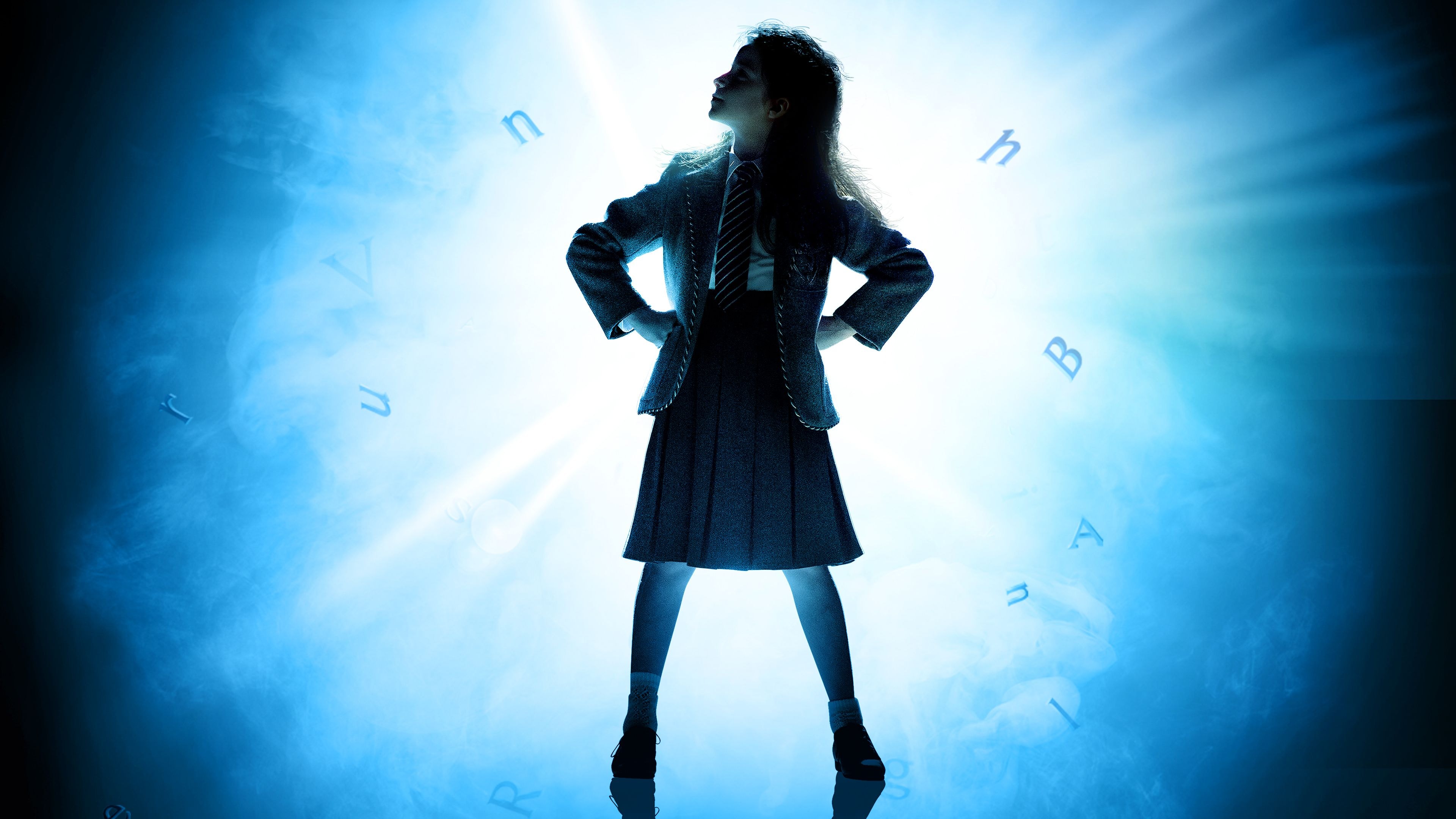 Confident girl silhouette in uniform, backlit by bright blue light with subtle musical notes.